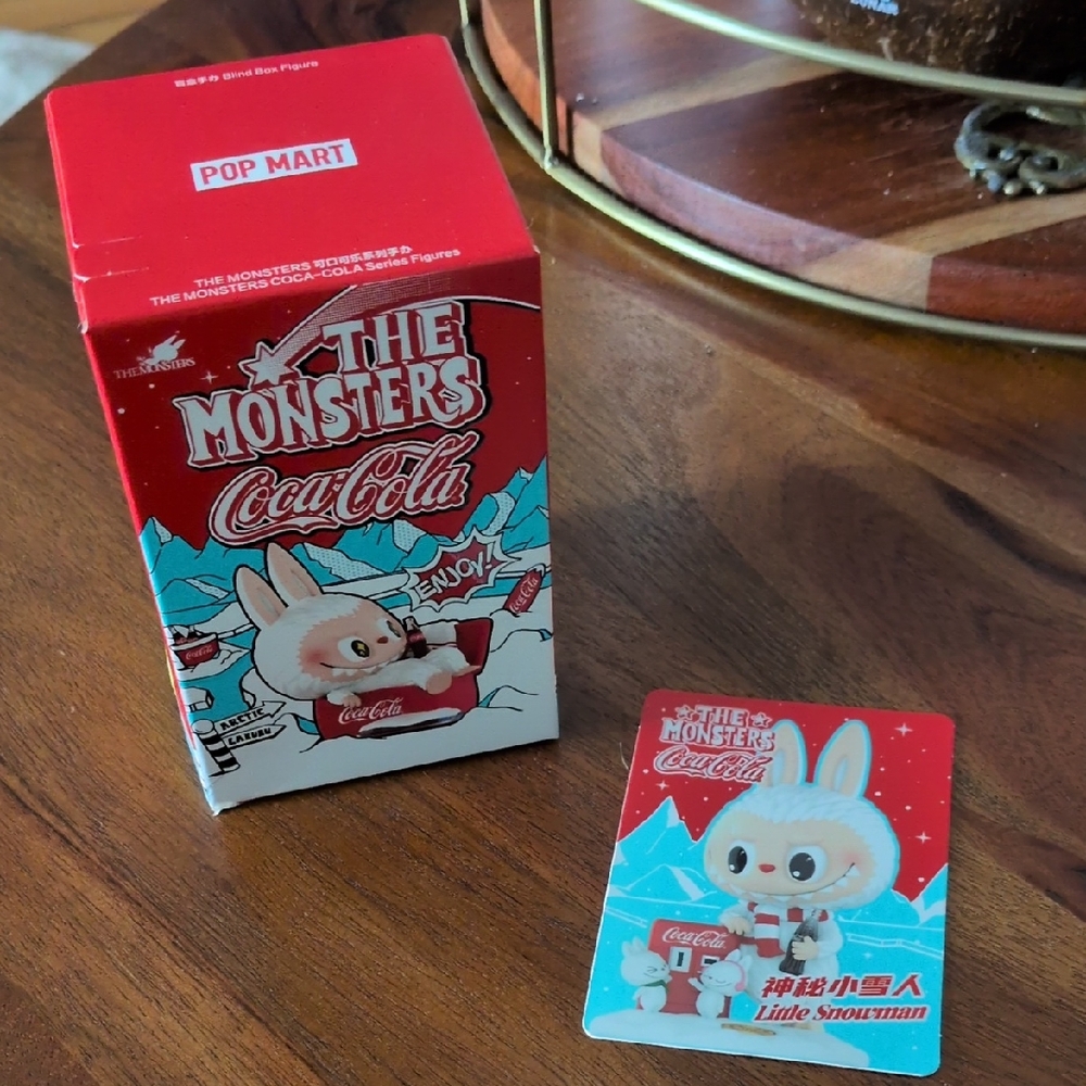 The Monsters Coca-Cola Labubu figurine. UNOPENED & AUTHENTIC - Little Snowman